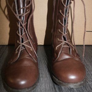 Laced up low heel ankle combat boots